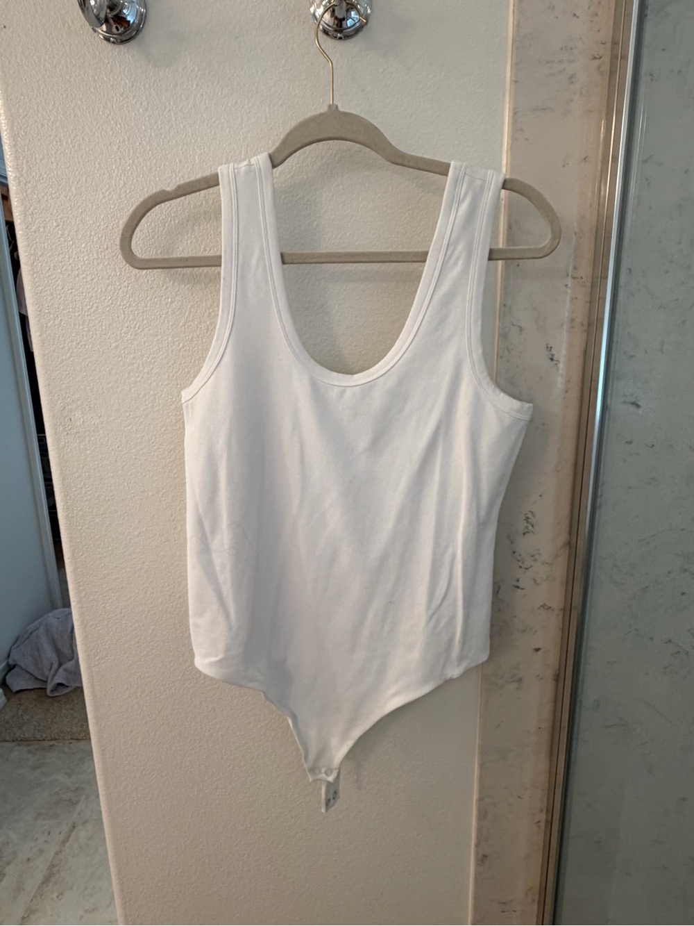 nuuds White Sleeveless Scoop Neck Bodysuit